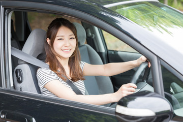 Naklejka premium 女性と自動車
