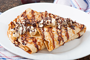 Pancakes with chocolate syrup
