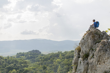 Young man hiking on the mountain