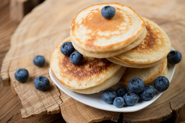 Fritters with fresh blueberries, close-up, horizontal shot