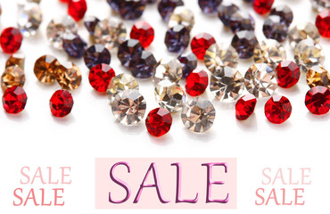 Concept of discount. Beautiful gem stones
