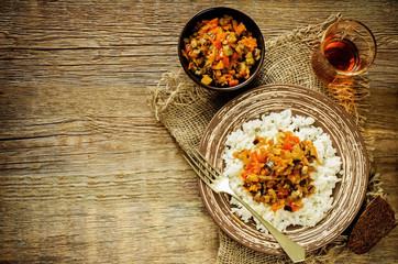 rice with sauce of eggplant, peppers and tomatoes