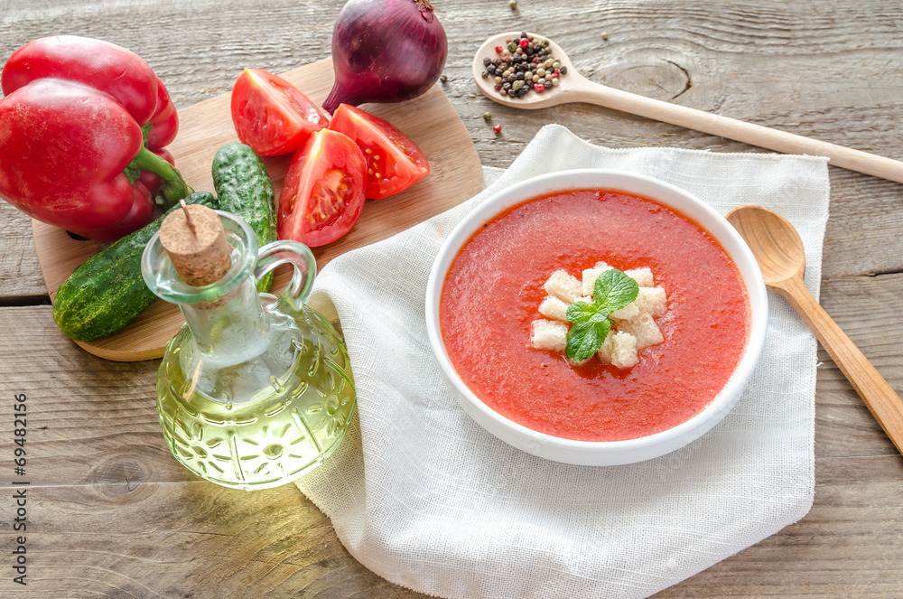 Wall mural Portion of gazpacho with ingredients