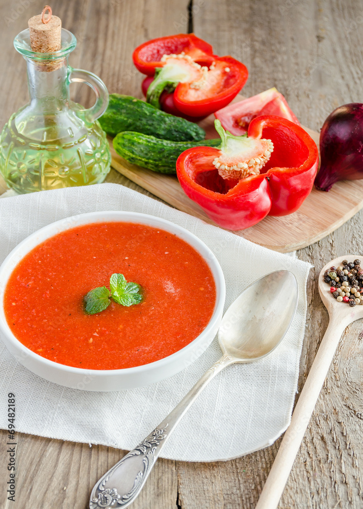 Wall mural Portion of gazpacho with ingredients