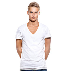 Handsome teen guy in white t-shirt isolated on white