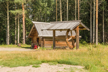 Arkhangelsk, Russia. Barn, the end of the XIX century and well