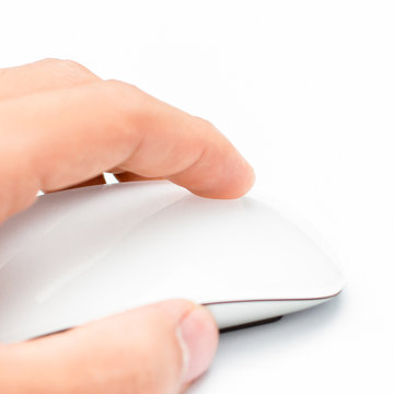 Hand click on modern computer mouse isolated on a white backgrou