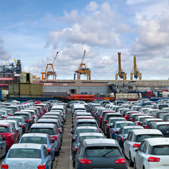 Cargo sea port. Sea cargo cranes. Cars.