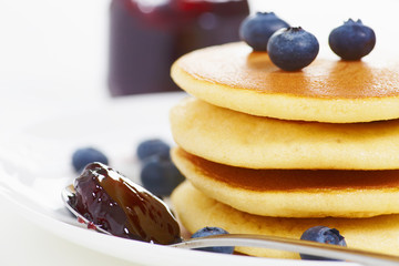 Pancake on white with jam b
