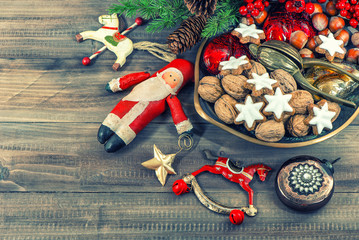 christmas cookies and walnuts with vintage decorations