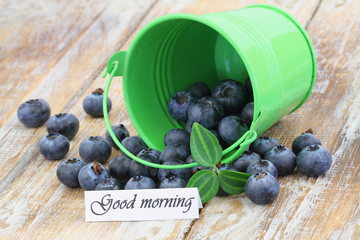 Good morning card with blueberries scattered out of green bucket