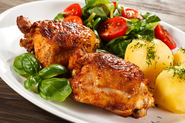 Grilled chicken legs with vegetables