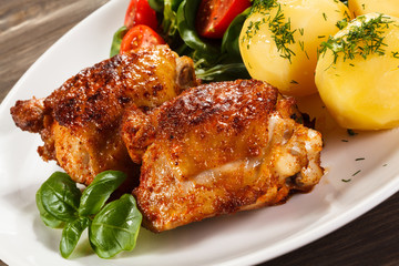 Grilled chicken legs with vegetables