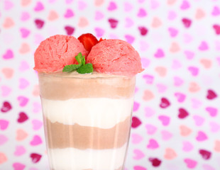 Tasty chocolate mousse with sorbet on bright background