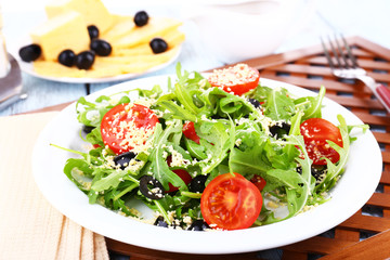 Fresh salad with arugula, close up