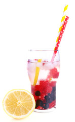 Glass of berry cocktail with lemon and mint