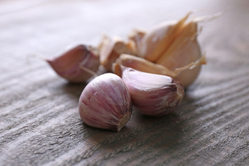 Fresh garlic on wooden background
