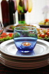 Restaurant table setting with candles