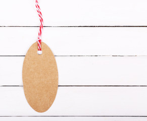 empty tag on white wooden background