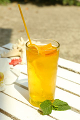 Refreshing cocktail on table, outdoors