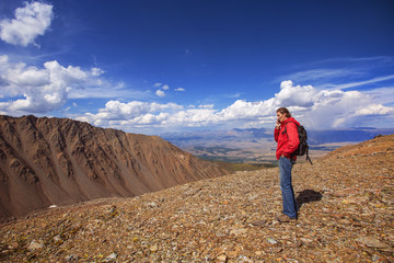 Fototapeta premium Connection in the mountains. Man speaks by phone