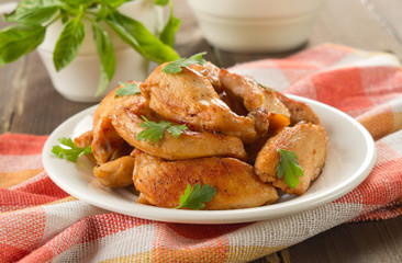 Pieces of chicken fried