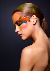 Naklejka premium Woman with fashion feather eyelashes make-up