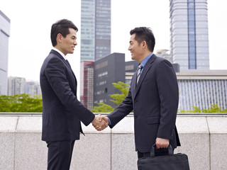 business people shaking hands