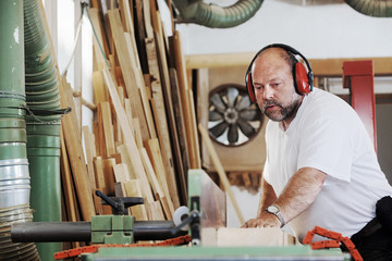 Carpenter at the Planing Machine