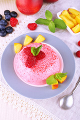 Round shaped cake with fruits and berries