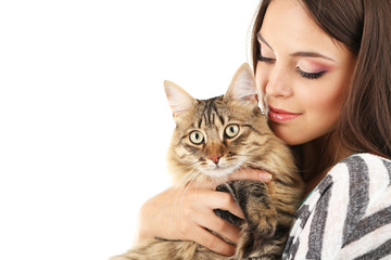 Beautiful young woman holding cat isolated on white