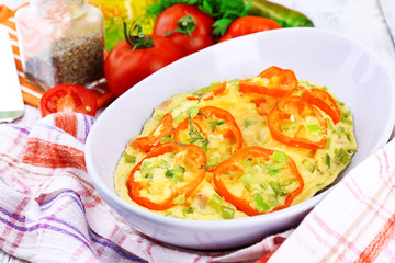 Casserole with vegetables in bowl  on natural background
