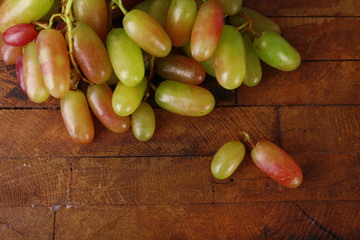 Grape on wooden background