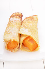 Crepes with apricot slices