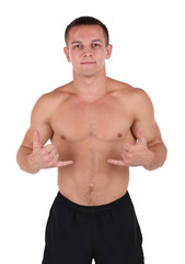 Fototapeta premium Handsome muscle young man isolated on white