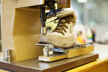 Manufacturing of brown demi-season boots
