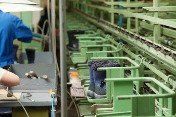 Production of blue demi-season boots