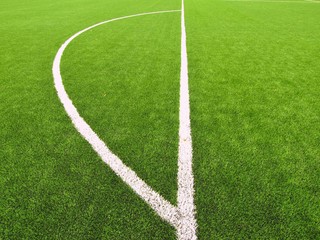 Fototapeta premium Football playground view of artificial grass field at gate