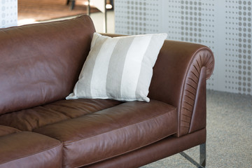 Brown leather bench in furniture showroom