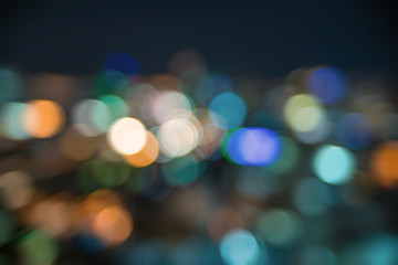 Urban city night light bokeh , defocused blur background