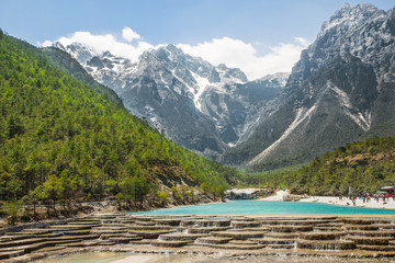 White Water River waterfall and Jade Dragon Snow Mountain, Lijia © Prasit Rodphan