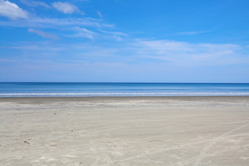 Fototapeta na wymiar Summer background of sea sand and nice beach