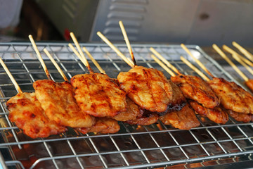 grilled pork with stick on stainless mesh