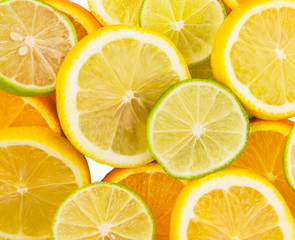 Slices of lemon, lime and orange close up view
