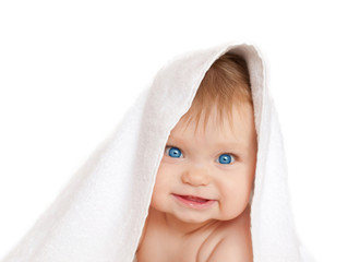 happy smiling baby with towel on head