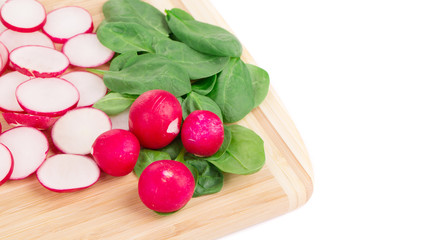Wooden platter with vegetables.