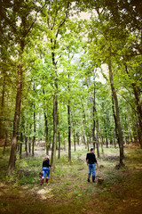 Obraz premium Happy family in forest