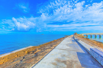 Breakwater with benches and the horizon