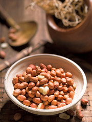 rustic raw uncooked peanuts