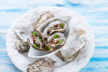 oysters with parmesan and baked tomatoes